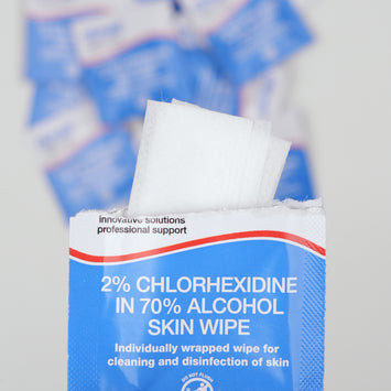 Opened sachet, white background